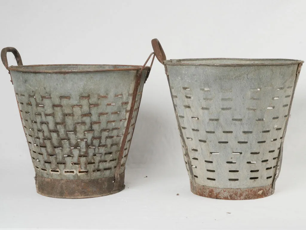 Pair of rustic zinc perforated olive buckets 18"