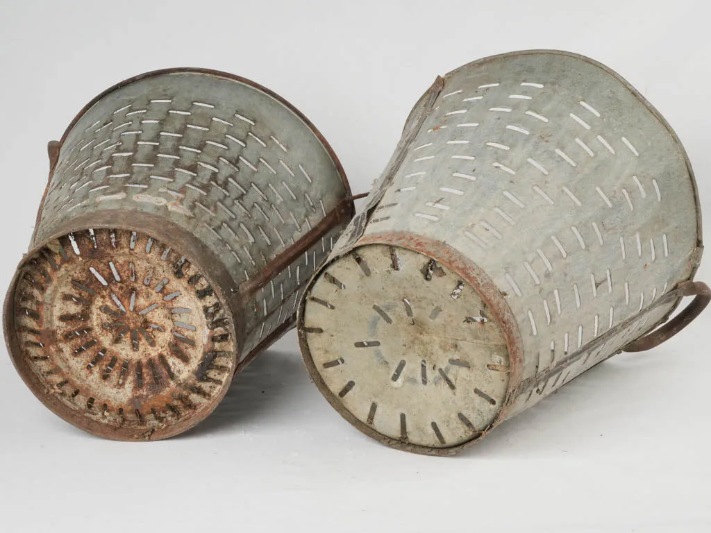 Pair of rustic zinc perforated olive buckets 18"